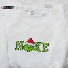 Introducing the Grinch Christmas x Nike Movie Embroidered Shirt, a unique blend of holiday spirit and iconic Nike style. This Nike Inspiration, Nike Inspired, The Grinch Christmas, Shirt Nike, Anniversary Gifts For Husband, Hoodie Material, Anniversary Gifts For Wife, Grinch Christmas, Embroidered Clothes