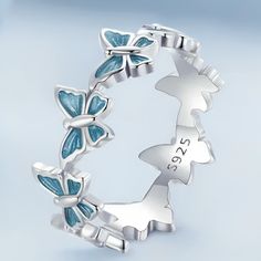 Introducing the Blue Butterfly Ring & Earrings Jewelry Set, a harmonious pairing of elegance and charm. The delicate blue butterfly motif graces both the ring and earrings, creating a cohesive and enchanting ensemble that brings a touch of nature-inspired sophistication to your style. Gender: Women Main Stone: NONE Style: TRENDY Shape\pattern: Heart Jewelry Sets Type: Earring/Ring Item Type: Jewelry Sets Item Weight: 2.9g Side Stone: Other Artificial material Material: 925 Sterling Silver Blue Butterfly Ring, Butterflies Symbolize, Mini Butterfly, Stackable Rings Wedding, Silver Certificate, Blue Butterflies, Butterfly Ring, Butterfly Jewelry, Wedding Band Sets