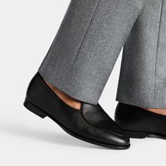 Crafted in Portugal from fine Italian grain calf leather, these black penny loafers feature a sleek leather sole and are constructed using the durable Blake method. Perfect for a timeless and refined look. Timeless Slip-on Moccasins For Business, Formal Tassel Loafers With Textured Sole And Almond Toe, Formal Tassel Loafers With Textured Almond Toe, Timeless Business Slip-on Loafers, Classic Slip-ons With Leather Footbed For Business Casual, Timeless Workwear Slip-ons With Plain Toe, Formal Calf Leather Slip-ons With Leather Sole, Formal Calf Leather Slip-ons With Leather Footbed, Black Tassel Loafers For Business With Leather Footbed