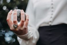 a close up of a person holding a cell phone