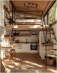 a loft bed is built into the side of a small kitchen with stairs leading up to it