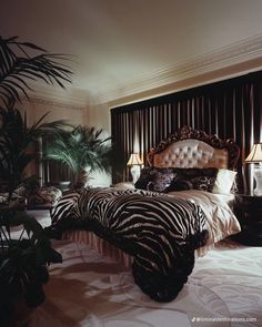 a zebra print bed in a luxurious bedroom