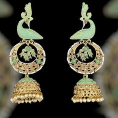 Peacock meenakari jhumka earring in sea green color with pearl and meena details. This Indian statement jhumka  earring Is perfect to pair with any outfits and occasions.  All orders Ship same day if placed before 4:00 PM EST  Create beautiful memory for any occasion with elegant jewelry for your loved ones You will receive carefully packaged items in jewelry box, ready to give memorable gift  to your Wife, mother, sister  friend or collegue. All orders will be shipped  out in 1 business day aft Green Jhumka, Punjabi Jewelry, Earring Long, Peacock Jewelry, Schmuck Gold, Sea Green Color, Peacock Earrings, Jhumka Earrings, Green Earrings