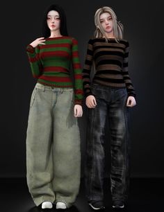 two women standing next to each other in front of a black background, one wearing green and red striped sweater