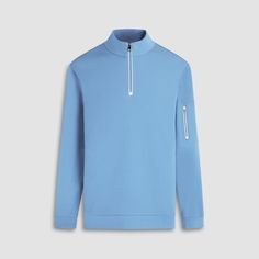 This long-sleeved pullover made from 100% cotton for superior comfort and breathability, features a beehive pattern on the front, solid sleeves and back, a mock neck, a quarter-zip closure and a practical sleeve pocket. Perfect for layering in cooler weather. Cotton Long Sleeve Golf Sweatshirt, Winter Golf Tops With Long Sleeves, Casual Winter Golf Tops, Functional Long Sleeve Cotton Tops, Winter Long Sleeve Sweatshirt With Ykk Zipper, Fall Long Sleeve Sweatshirt With Ykk Zipper, Blue Half-zip Tops With Ribbed Cuffs, Outdoor Half-zip Cotton Sweatshirt, Casual Long Sleeve Golf Tops