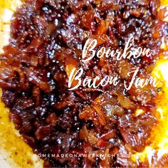 a close up of food on a plate with the words bourbon bacon jam above it