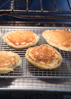 pancakes cooling on a rack in an oven, ready to be baked into the oven