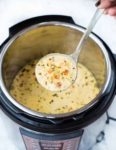 a spoon full of soup in an instant pot