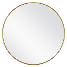 a round mirror on a white background with gold trim around the edges and bottom edge