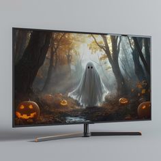 a flat screen tv with a ghost on it and pumpkins in the woods behind it