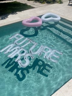 there is an inflatable sign that says bubble boats on the side of a swimming pool