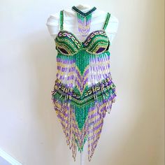 a dress made out of beads and chains