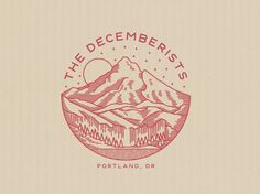 the decemberists logo is shown in red on a beige background with mountains and trees