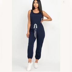 Soft Stretch Light Weight Double Knot Jersey Elasticized Waist With Ribbon Bow Model Is 5’8” Wearing A Size S Casual Fitted Jumpsuits And Rompers With Drawstring, Blue Sleeveless Cotton Bodysuit, Casual Sleeveless Bodysuit, Casual Blue Cotton Bodysuit, Sporty Blue Jumpsuits And Rompers For Spring, Blue Athleisure Jumpsuits And Rompers For Summer, Blue Stretch Casual Jumpsuits And Rompers, Casual Blue Stretch Jumpsuits And Rompers, Navy Sleeveless Fitted Jumpsuits And Rompers