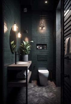 a bathroom with a toilet, sink and mirror next to a plant in the corner