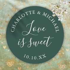 a round sticker with the words charlotte and michael love is sweet written on it