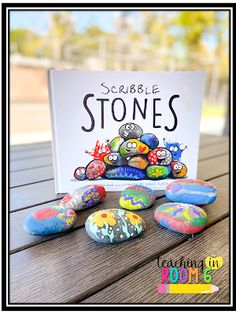 some kind of rock sitting on top of a wooden table next to a sign that says scrubble stones