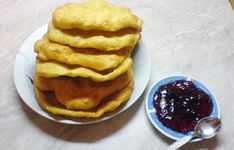 a stack of waffles sitting on top of a white plate