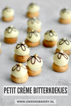 small cookies with white frosting and bows on them