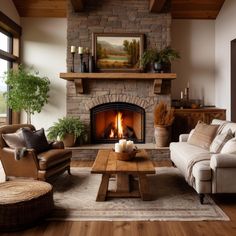 a living room filled with furniture and a fire place in the middle of a room