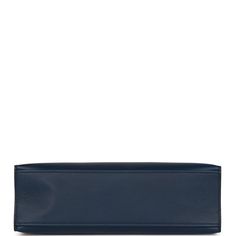 This Hermes Kelly Pochette is in Bleu Navy swift leather with gold hardware, tonal stitching, front flap with two straps, toggle closure and single flat handle. The interior is lined with Bleu Navy Lambskin and has an open wall pocket. Collection: YOrigin: FranceCondition: Pristine; new or never (plastic on hardware)Accompanied by: Hermes box, Hermes dustbag, felt, carebook and ribbonMeasurements: 8.5" width x 5.5" height x 2.75" depth; 1" handle drop Hermes Kelly Pochette, Kelly Pochette, Open Wall, Hermes Shoes, Hermes Box, Fendi Shoes, Dior Shoes, Wall Pockets, Chanel Shoes