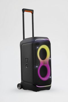 a black suitcase with colorful lights on it's side and handles, sitting upright