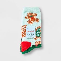 Keep little feet warm and stylish with this Kids' 2pk 'Candy Cane' Cozy Crew Socks from Cat & Jack™ Green. Featuring playful candy cane prints, these socks are made from a lightweight knit material, perfect for all-day comfort. They’re soft, snug, and great for lounging at home or wearing out and about. A fun and comfy addition to any kid’s wardrobe. Cat & Jack™: Designed for all children so you can trust it's made for yours. Playful Soft Winter Socks, Playful Super Soft Winter Socks, Playful Soft Socks For Winter, Playful Super Soft Socks For Winter, Cute Snug Winter Socks, Cute Snug Socks For Winter, Soft Socks For Winter, Comfortable Winter Socks For Playtime, Comfortable Socks For Winter Playtime