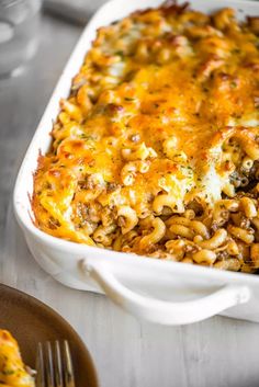 a casserole dish filled with macaroni and cheese