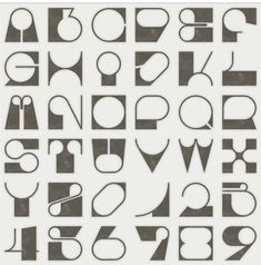 the letters and numbers are drawn in black ink on white paper, which has been cut into