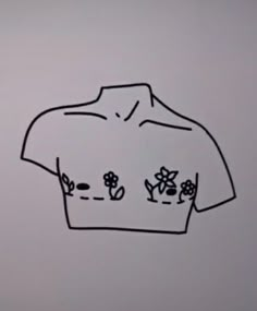 a drawing of a t - shirt with flowers drawn on the front and back of it