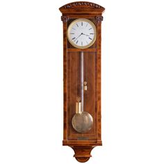 an antique grandfather clock with pendulums on the sides