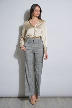 Meet the pant of the season! Our wide leg Plaid Pant features a high-rise silhouette & pockets. Designed with a chic metal buckle, this pant will quickly become a staple in your wardrobe. High Rise, Wide Leg Plaid Pant with Removable Belt 66% Polyester, 32% Viscose, 2% Elastane Runs true to Size Model is 5'9" and wearing size 4 Measurements: 13"L Front Rise; 32"L Inseam (approx. length for a size 6) Dry Clean Only Imported Style #: ETR34153 Fall Wide Leg Pants With Belt Loops For Work, Wide Leg Pants With Belt Loops For Fall Workwear, Fall Season Belted Ankle-length Pants, Fall Belted Ankle-length Pants, Belted Ankle-length Pants For Fall, Fall Ankle-length Belted Pants, Elegant Wide Leg Bottoms With Belted Cuffs, Chic High Waist Wide Leg Pants With Belted Cuffs, High Waist Belted Wide Leg Work Pants