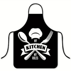 an apron with the words my kitchen, my rules written on it and two spoons