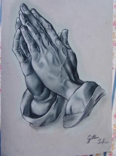 a drawing of a praying person with his hands together