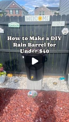 a trash can sitting in front of a fence with the words how to make a diy rain barrel for under $ 40