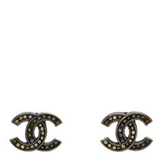 This is an authentic pair of CHANEL Crystal CC Earrings in Silver. These stylish pierced stud earrings are in a silver-tone and feature Chanel CC logos set with brilliant crystals. Cc Earrings, Logo Set, Earrings Silver, Silver Earrings, Silver Tone, Chanel, Stud Earrings, Crystals, Silver