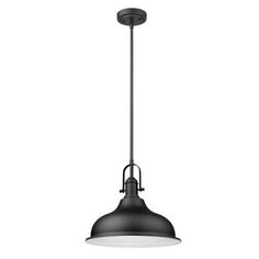 an industrial style pendant light fixture with black metal finish and white glass diffuser, hanging from