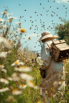 a man in bee suit and hat with bees flying over his head on a sunny day