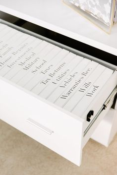 a drawer with writing on it is open