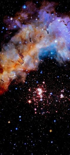 an open star cluster in the sky with stars all around it and some bright colors