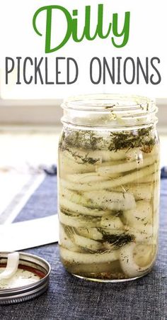 pickled onions in a mason jar with text overlay that reads diy pickled onions