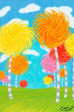 an image of three colorful lollipops in the grass with clouds behind them