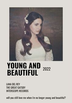 a woman with long hair and flowers in her hair is featured on the cover of young and beautiful magazine