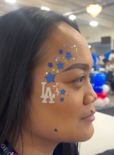 Face Glitter Football Game, Game Day Cheer Makeup, Blue And Gold Face Paint Spirit Week, Competitive Cheer Makeup, Game Day Makeup Cheer, Game Day Makeup Football, School Spirit Makeup, Football Makeup Ideas