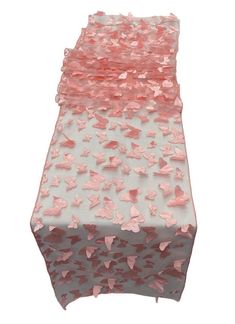 pink and white table runner with butterflies on it