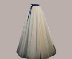 Gray tulle party skirt,long wedding skirt,tulle floor skirt,wedding photoshoot,bridal skirt The skirt can be made-to-order. Please tell me the following information in your order: Waist:  Hips:  Hollow to Floor(barefoot):  Height(barefoot):  Date you need the dress:  There is no extra charge for made-to-order dresses. If you choose a STANDARD SIZE, then I need: Standard Size Number(like size 2, size 4):  Date you need the dress: Floor Skirting, Bridal Skirt, Skirt Tulle, Bridal Skirts, Wedding Skirt, Party Skirt, Skirt Long, Wedding Photoshoot, Long Skirt