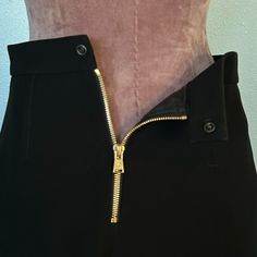 Lightly Worn, Like New. Louis Vuitton Uniform Pencil Skirt That Doesn’t Read As Uniform. Fully Lined With A Beautifully Tailored Silhouette Punctuated With A Gold Tone Back Zipper With Iconic Logo Zipper Pull. Size French 34 Fits As Xs. 13” Across Waist Flat 16” Across Hips22” Long. As It Is A Uniform Item The Fabric Content Is Polyester. Tone Back, Iconic Logo, Red Gold, Pencil Skirt, Pencil, Louis Vuitton, Zipper, Skirt, Fabric