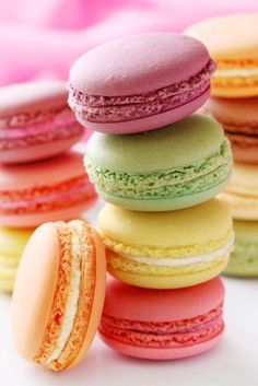 colorful macaroons are stacked on top of each other with the words color inspiration