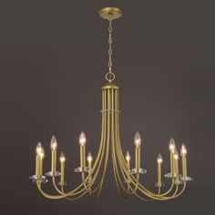 a gold chandelier with six lights hanging from it's center and four arms