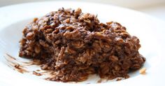 a white plate topped with granola and chocolate